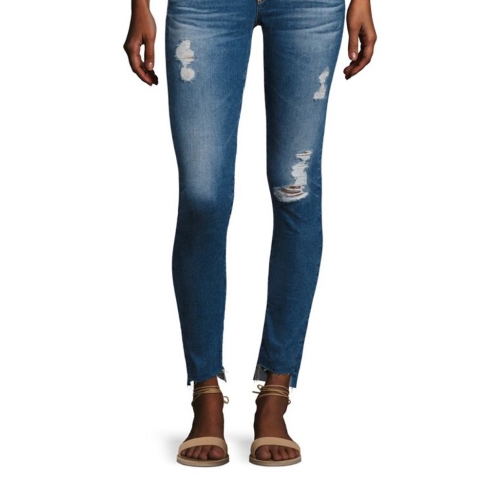 AG distressed step hem legging ankle jeans